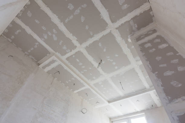 istock The ceiling of the room, covered with plasterboard sheets, and putty stitches 940561158