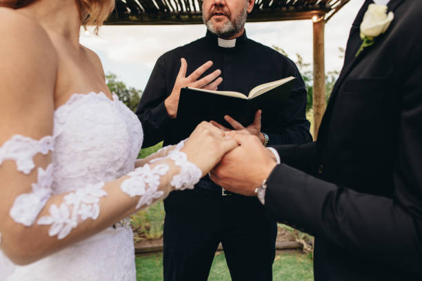 istock Couple at outdoor wedding ceremony 940566002