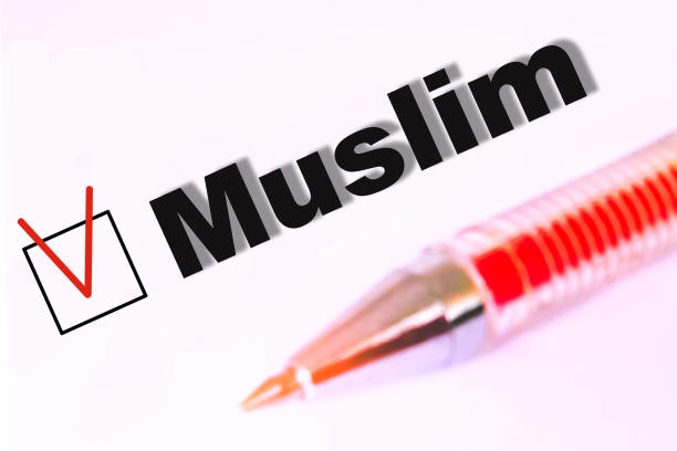 istock a questionnaire with a red pen and a Muslim inscription. square character 940587716