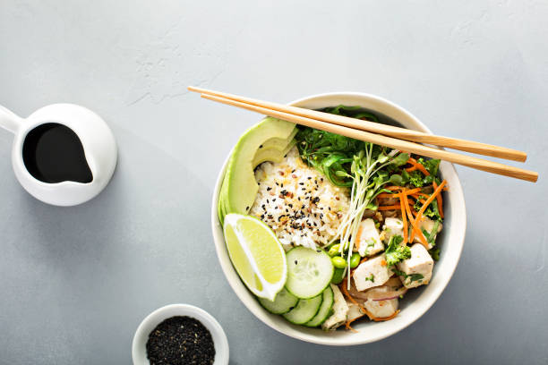 istock Poke bowl with silken tofu, rice and vegetables 940587950