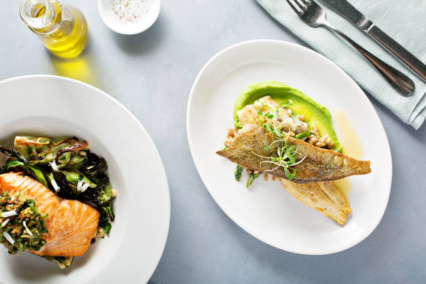 istock Gourmet grilled trout with crisped skin 940593342