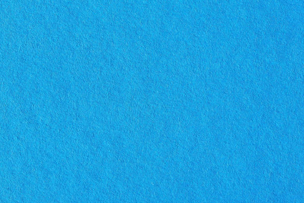 istock Close-up shot of light blue paper texture 940593876