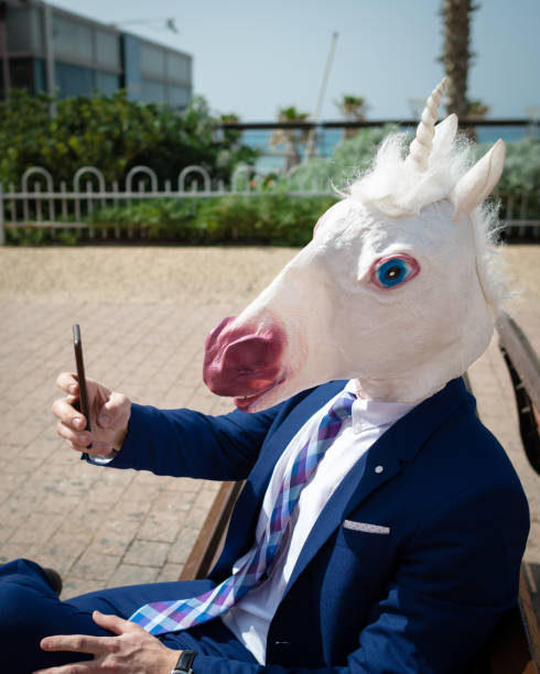 istock Unicorn makes a photo by phone 940598554