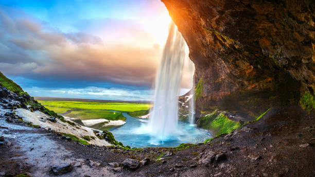 istock Seljalandsfoss waterfall during the sunset, Beautiful waterfall in Iceland. 940599838