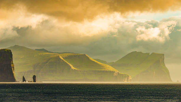 Panoramic view of Faroe islands seashore Panoramic view of Faroe islands seashore, summer time faroe islands photos stock pictures, royalty-free photos & images