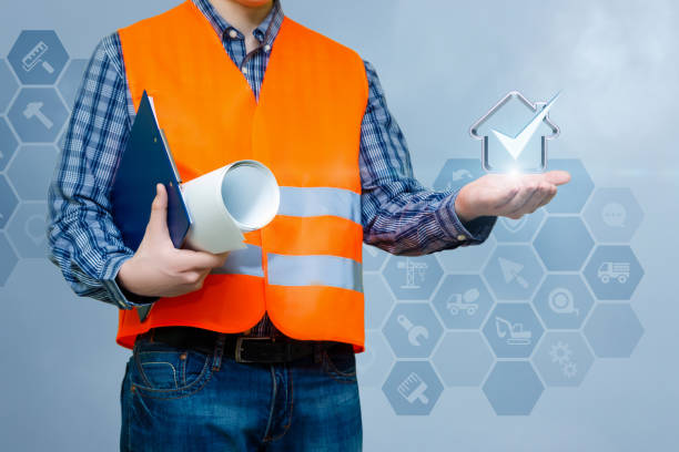 istock Builder shows in the hands of the house with a tick. 940603912