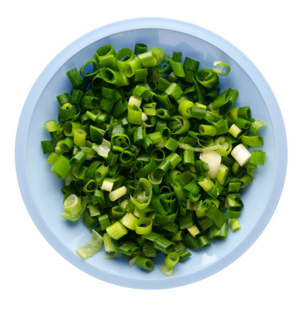 istock onion  on a plate isolated on white background 940610732