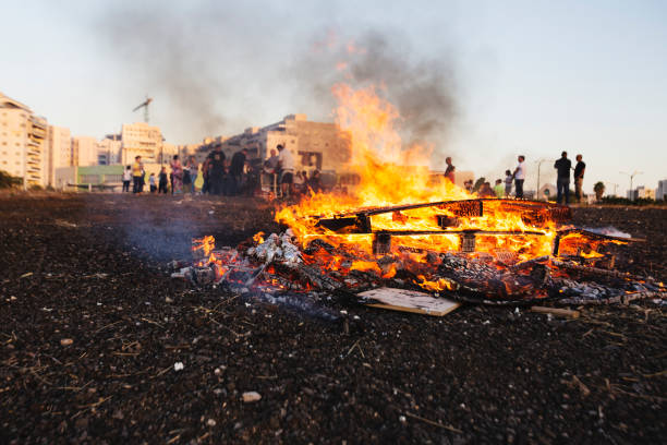 istock RISHON LE ZION, ISRAEL-MAY 11, 2017: Elementary school kids participating in festive Lag Baomer bonfires in Rishon Le Zion, Israel. 940640960