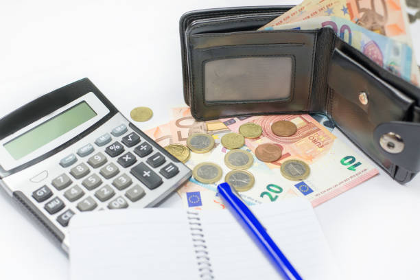 istock Euro money, glasses and calculator. Selected focus. 940644770