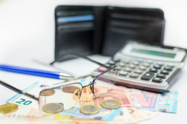 istock Euro money, wallet, glasses and calculator. Selected focus. 940645492