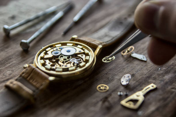 istock Watchmaker is repairing the mechanical watches in his workshop 940673348