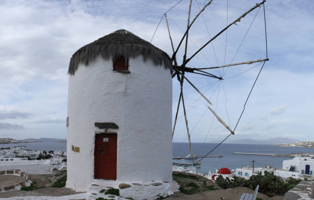 istock Windmills on Island of Mykonos, Greece 940683580