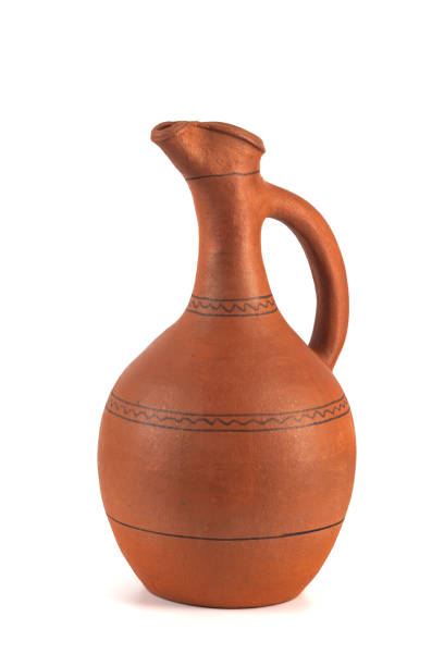 istock Georgian handmade ceramic jug, named Doqi, for wine and water on white background 940686714