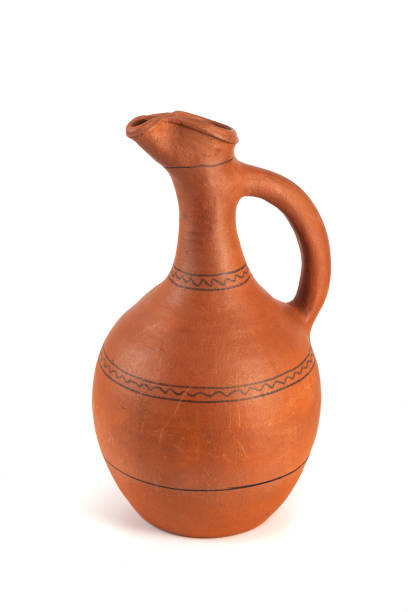 istock Georgian handmade ceramic jug, named Doqi, for wine and water on white background 940686770