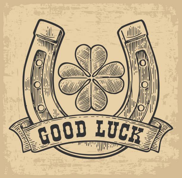 Four leaf clover, horseshoe, ribbon with text good luck. Vintage vector engraving illustration for info graphic, poster, web. Black on beige background.
