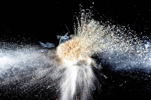 istock Close-Up Of Broken Light Bulb Against Black Background 940706056