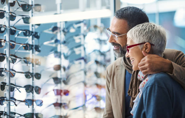 Mid aged couple in a shopping mall.