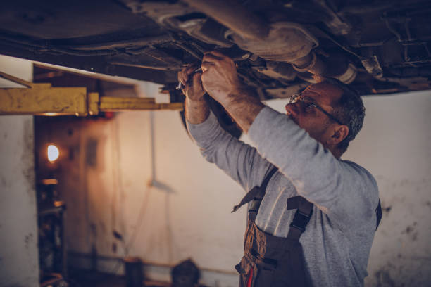 istock Car mechanic working in garage 940716930