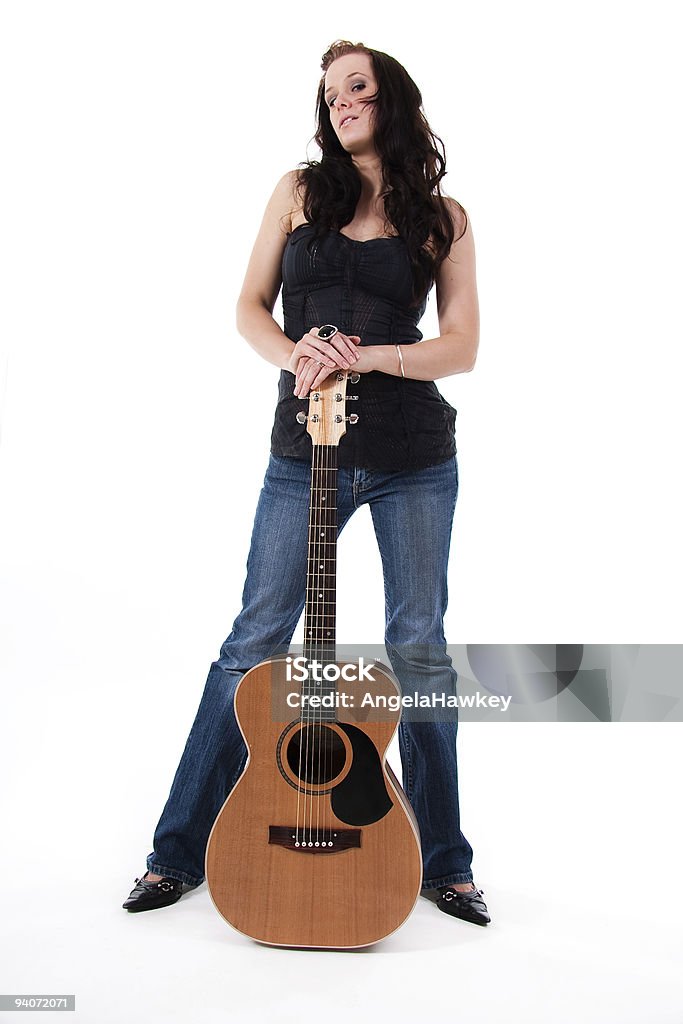 Female posing with a guitar  Adult Stock Photo