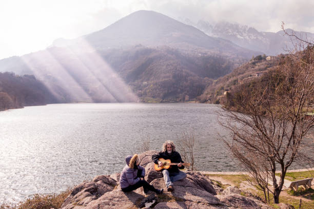 istock beautiful mature couple playing a guitar 940726760