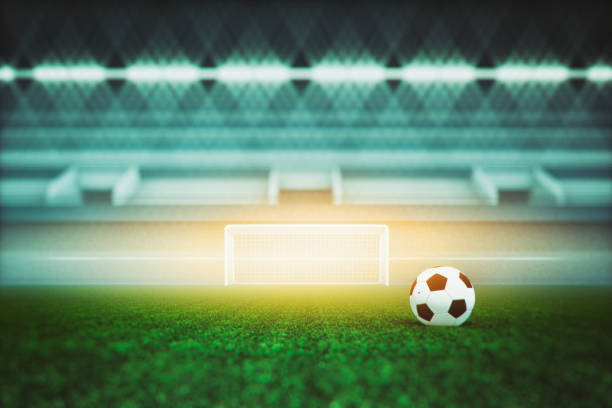 istock Empty football stadium in the evening 940727156