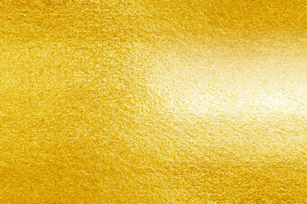 istock Shiny yellow leaf gold foil texture 940727850