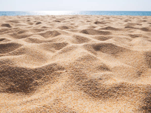 beautiful sand beach pattern background. brown sandy texture - sandy brown fotos imagens e fotografias de stock