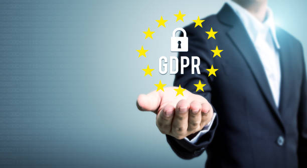 istock Businessman hand holding sign general data protection regulation (GDPR) and key icon 940738774