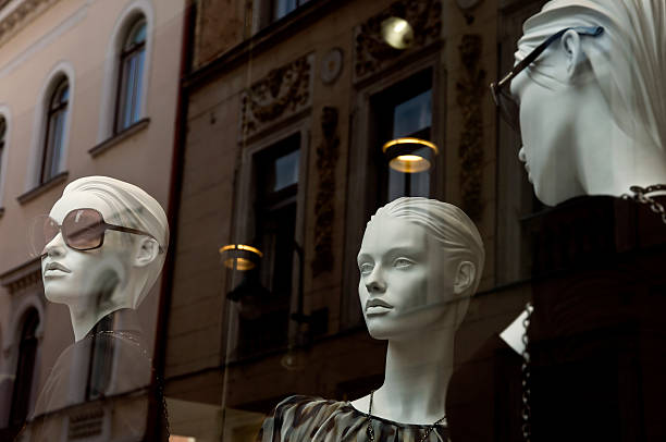 Mannequins in the shop window  mannequin photos stock pictures, royalty-free photos & images