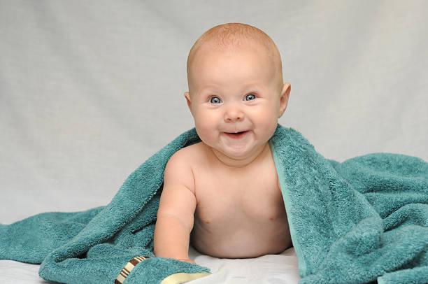 Cute Smiling Baby after Bath stock photo