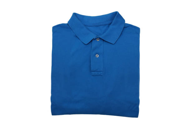 istock isolated folded blue polo shirt on white background 940767404