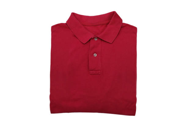 istock isolated folded red polo shirt on white background 940767456