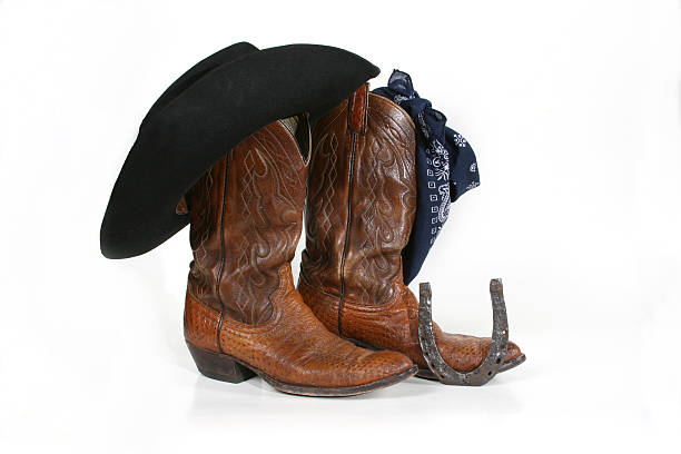 istock Cowboy boots,  hat, horse shoe and bandana 94077287