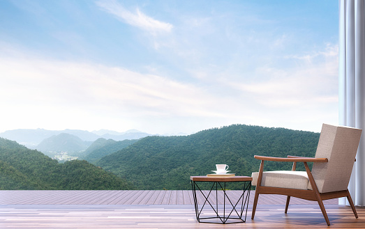 Lazy chair with mountain view 3d render.The room has wooden floor.Furnished with wood and fabric furniture.Looking out to the terrace and mountains view.