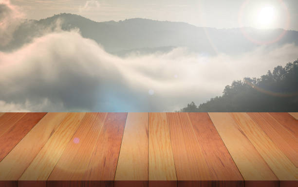 istock Empty top wooden table board and abstract blurred background. Natural Pine Wood Texture background 940788340