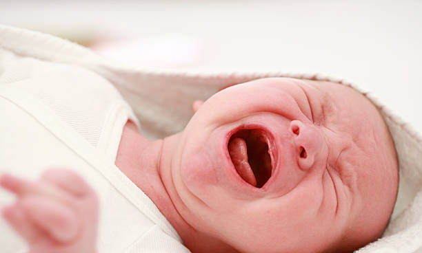 crying baby - lamentation stock-fotos und bilder