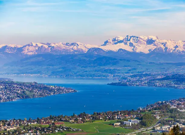 View from Mt Uetliberg in Switzerland in springtime. The Uetliberg is a mountain, offering a panoramic view of the city of Zurich and Lake Zurich from its summit.