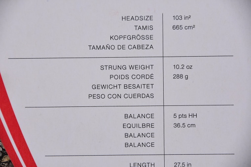 Details and measurements of a modern tennis racquet