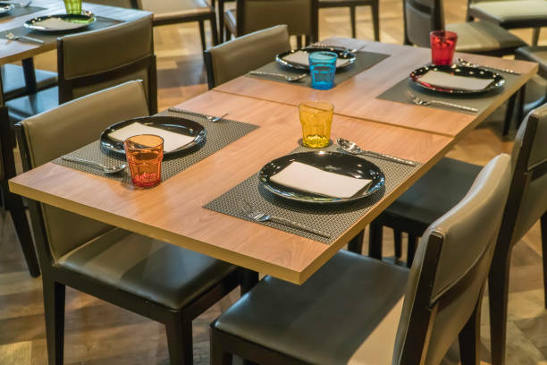 istock Modern dining room with dining table. Small depth of field 940799190