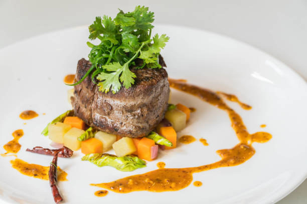 istock Grilled steak, French fries and vegetables 940800680
