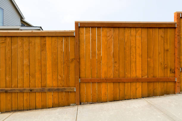 istock New home yard cedar wood fence construction 940833878