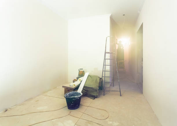 istock Interior of apartment  during construction, remodeling, renovation, extension, restoration and reconstruction - ladder and construction materials in the room 940851514
