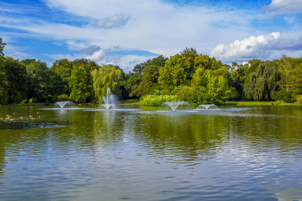 istock View of beautiful city park with pond 940877270