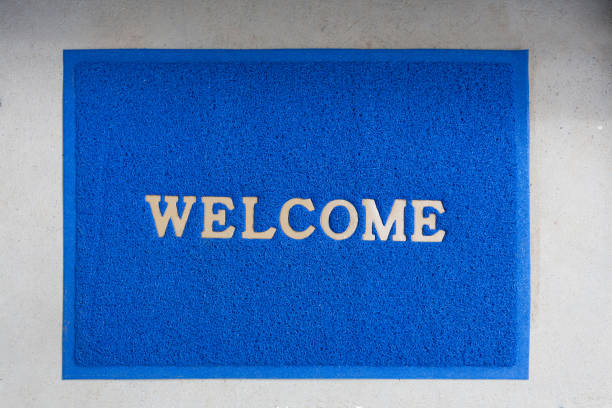 istock welcome blue carpet or door mat 940877406
