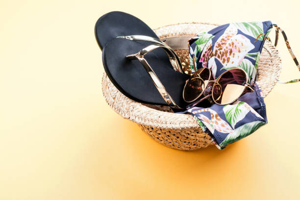 istock Summer vacation set - hat, bikini and flip flop 940880740