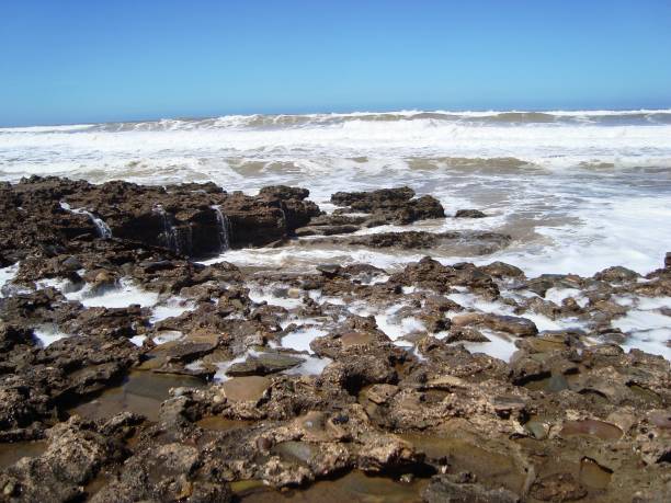 istock BEACH TAMARIS/MAREE HAUTE/ECUME/MOROCCO 940889284
