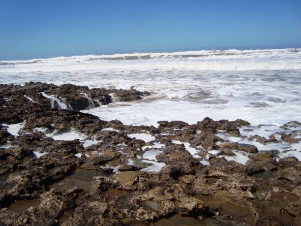 istock BEACH TAMARIS/MAREE HAUTE/ECUME/MOROCCO 940889524