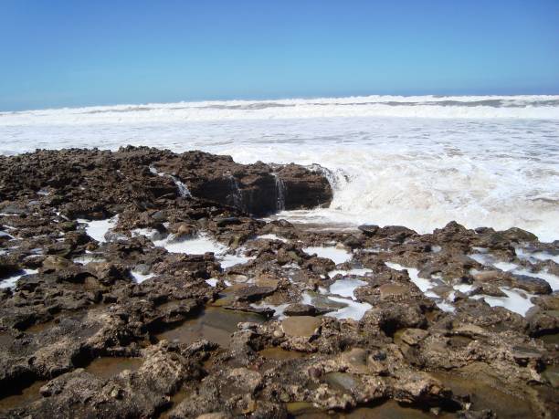 istock BEACH TAMARIS/MAREE HAUTE/ECUME/MOROCCO 940889590