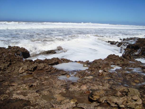 istock BEACH TAMARIS/MAREE HAUTE/ECUME/MOROCCO 940892240