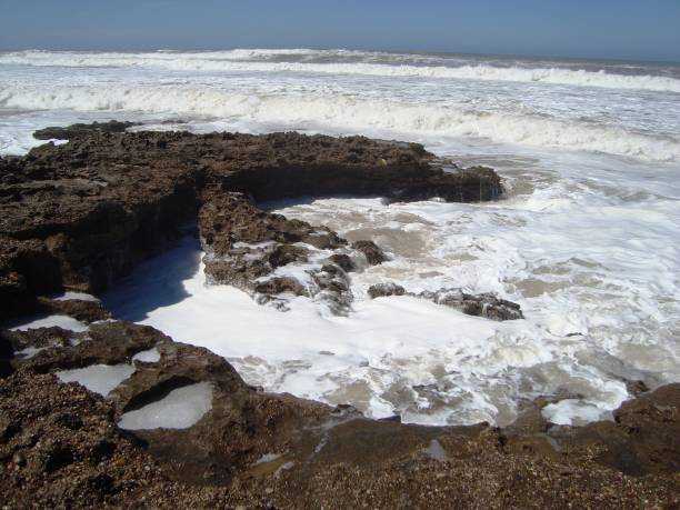 istock BEACH TAMARIS/MAREE HAUTE/ECUME/MOROCCO 940892276